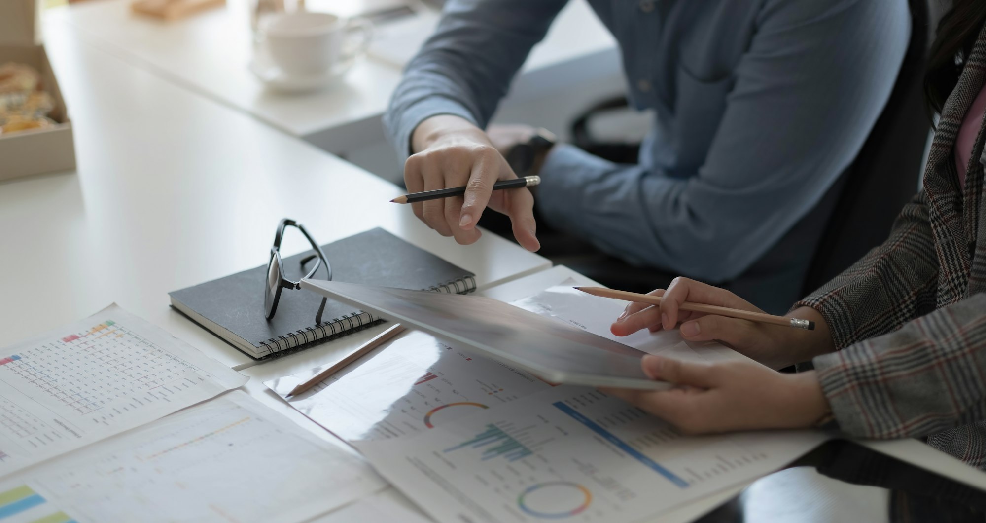 Team of business people working together in the meeting room office, teamwork background charts and